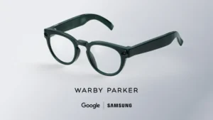 Gafas inteligentes de Google y Samsung diseñadas por Warby Parker de pasta en color oscuro.